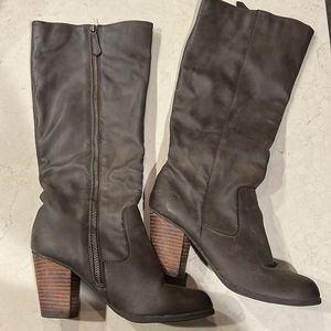 Brown heeled boots.